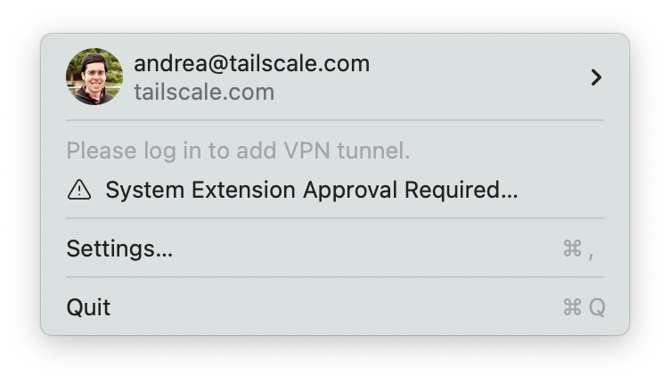 The warning for 'System Extension Approval Required...' in the Tailscale menu. This warning has an icon in the shape of an exclamation point in a triangle.
